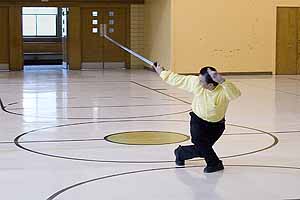 Grandmaster demonstrates a Tai Chi sword form